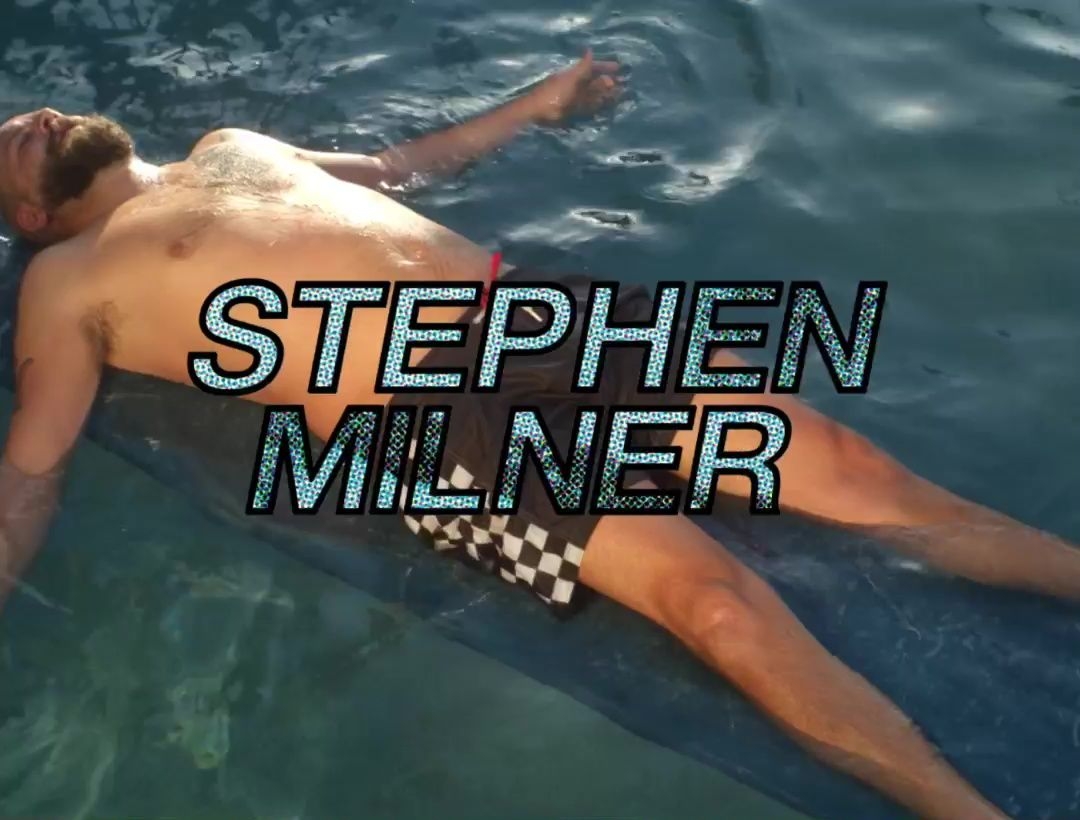 Artists Stephen Milner floating in water on his back