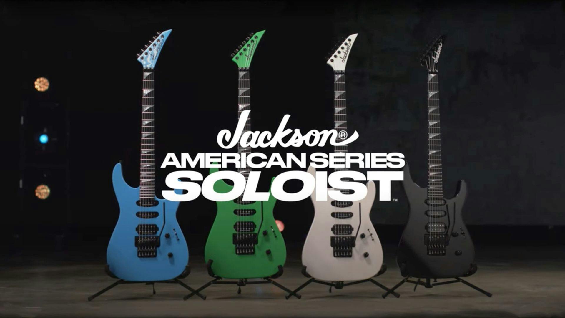 Jackson American Series Soloist campaign title card featuring the blue, green, white, and black guitar