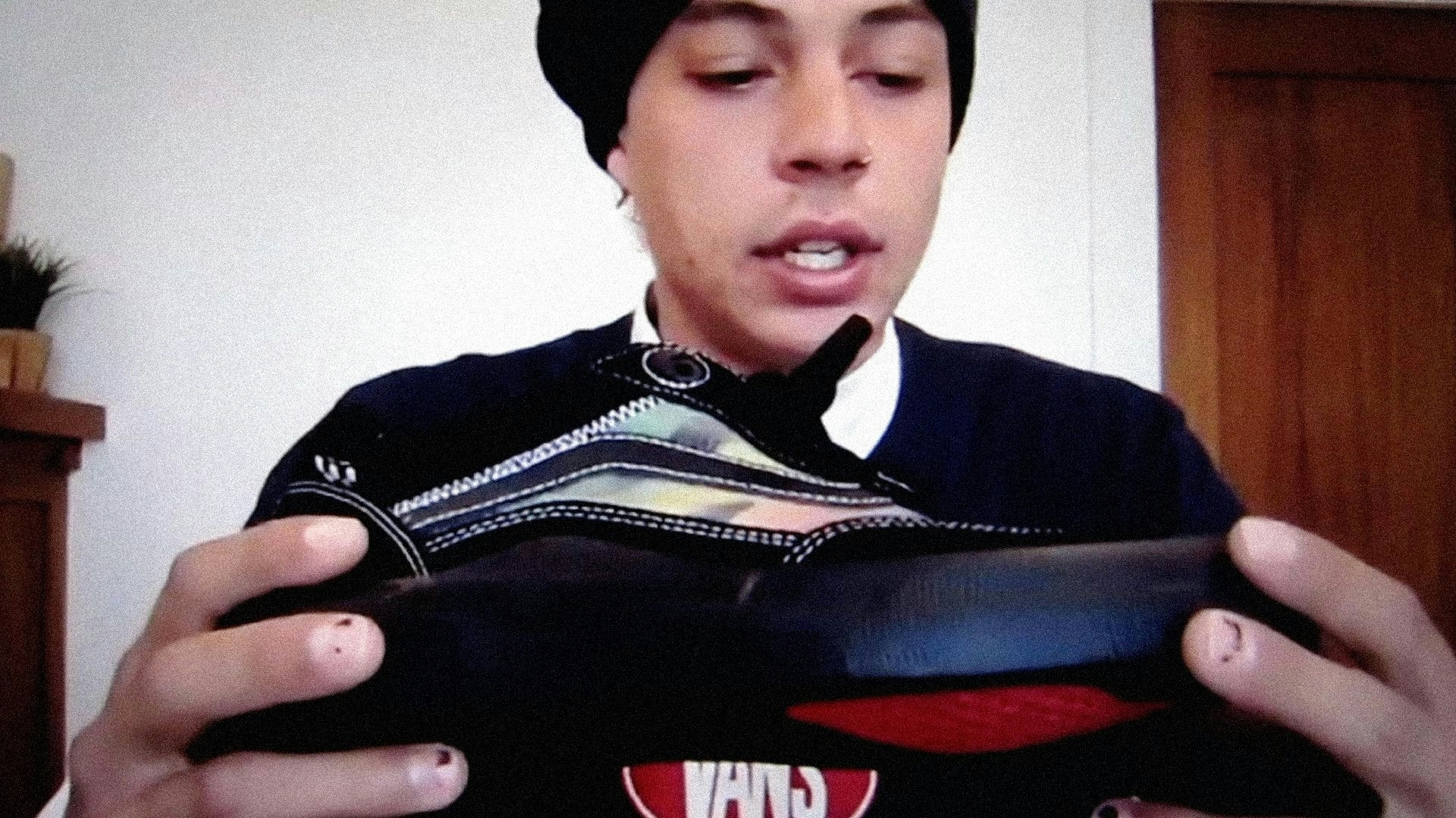 A person holds the shoe in front of the camera for the Vans The Wayvee Campaign